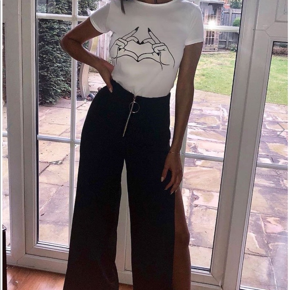 White hand heart graphic shirt